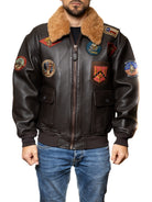 Giacca aviatore in pelle marrone Top Gun vista dal fronte con toppe ricamate.